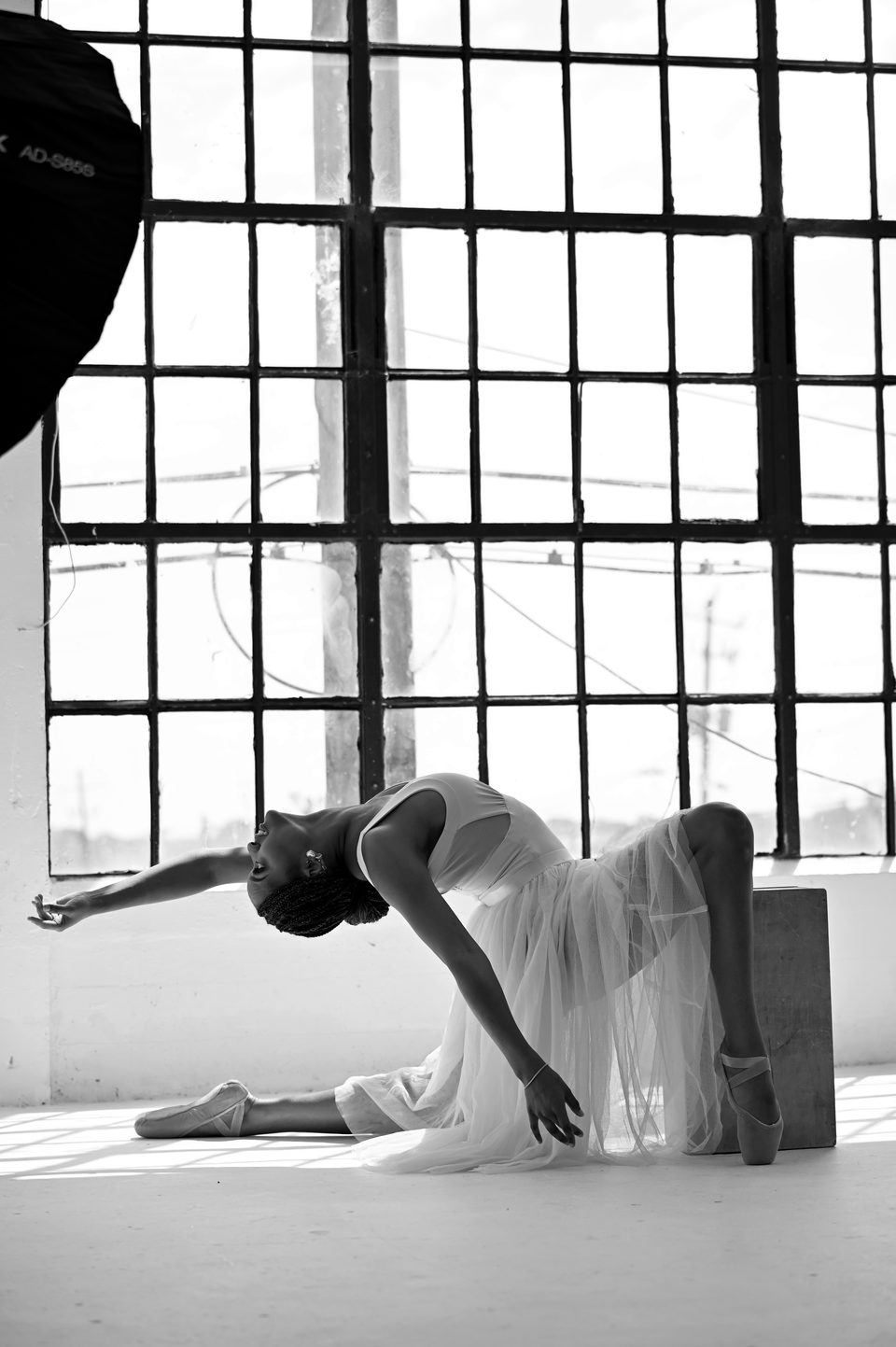 Deep backbend over a cube