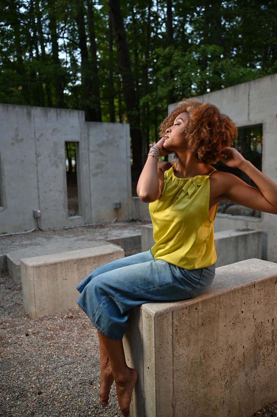 Seated on a concrete block