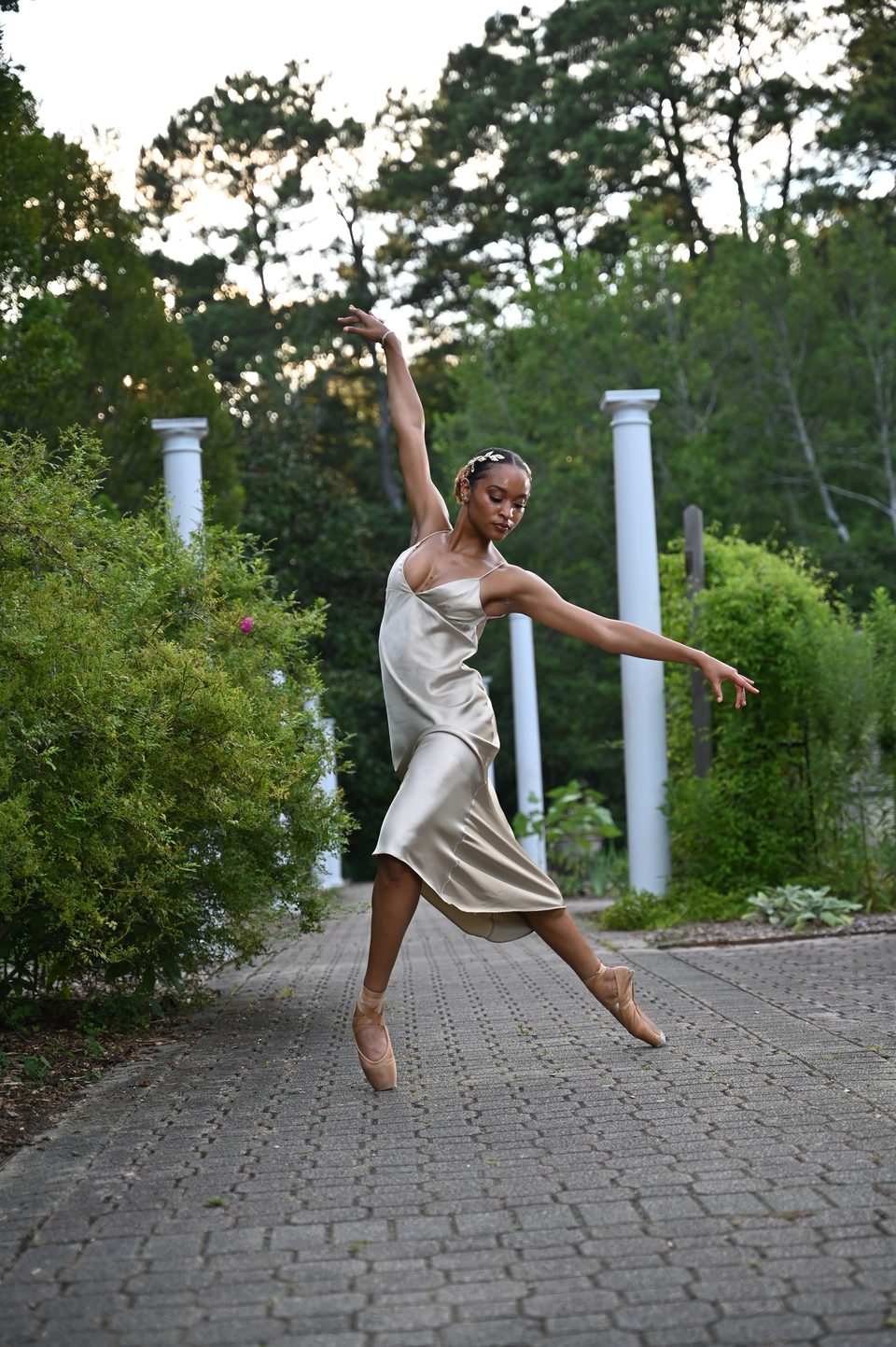 Leap in a satin dress